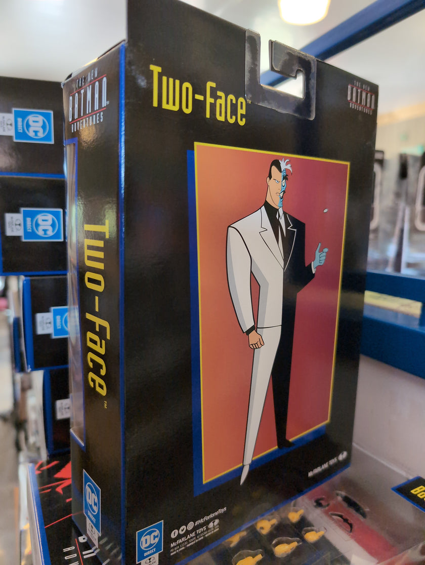 McFarlane Two-Face action figure packaging featuring stylized animated character from The New Batman Adventures series.