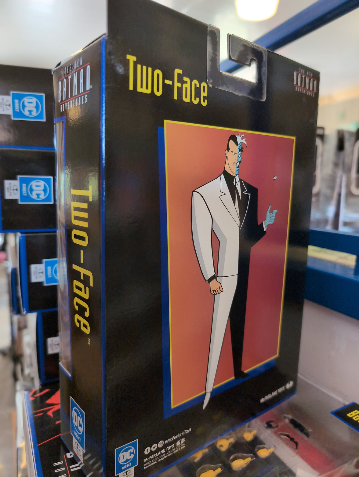 McFarlane Two-Face action figure packaging featuring stylized animated character from The New Batman Adventures series.