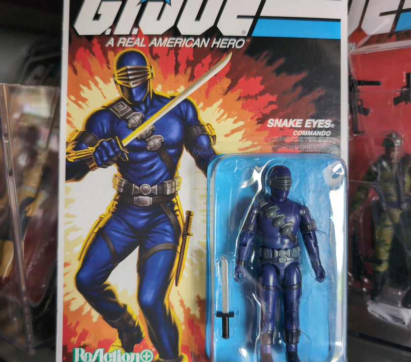 Hasbro Snake Eyes Commando blue action figure from G.I. Joe ReAction+ series in vintage packaging