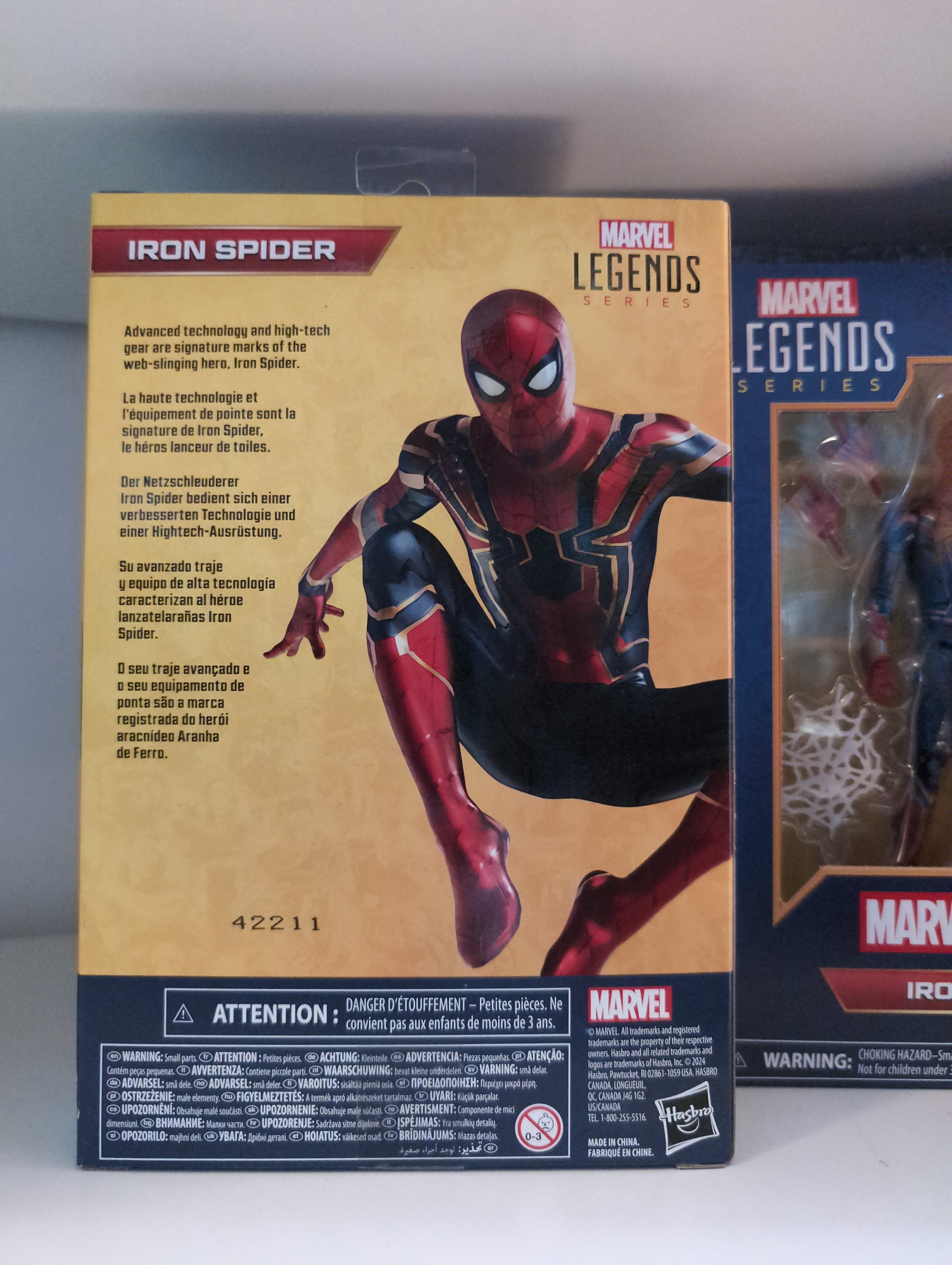 Hasbro Marvel Legends Iron Spider 6-inch action figure in detailed packaging with red and gold suit artwork