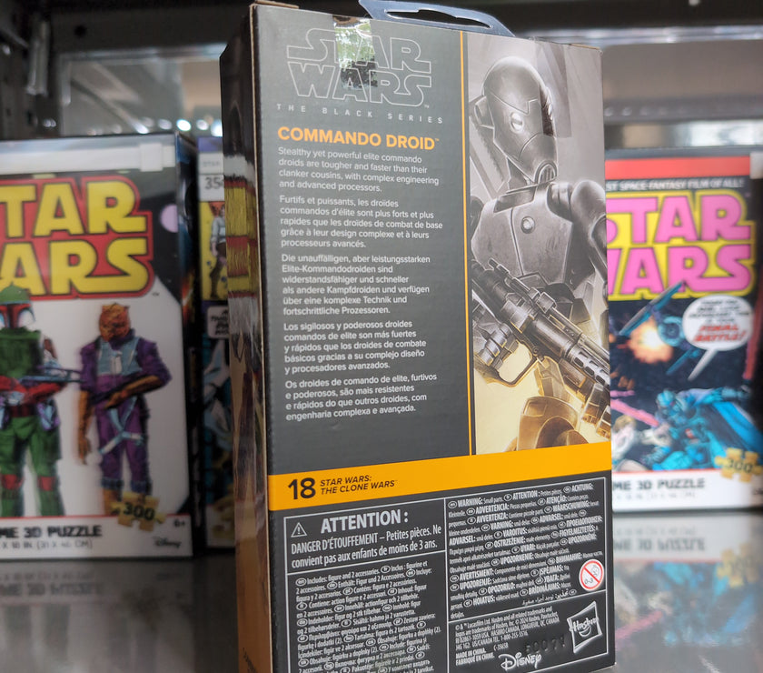 Hasbro Star Wars Black Series Commando Droid 1:12 scale action figure packaging with product details on shelf.