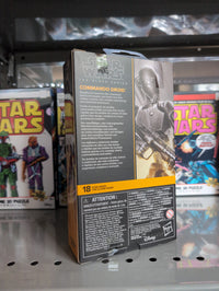 Hasbro Star Wars Black Series Commando Droid 1:12 scale action figure packaging with product details on shelf.