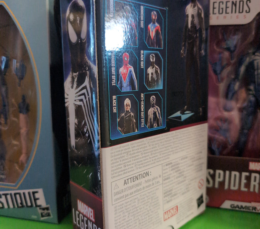 Hasbro Marvel Legends Black Suit Spider-Man action figure from Gamerverse displayed in retail packaging on shelf.