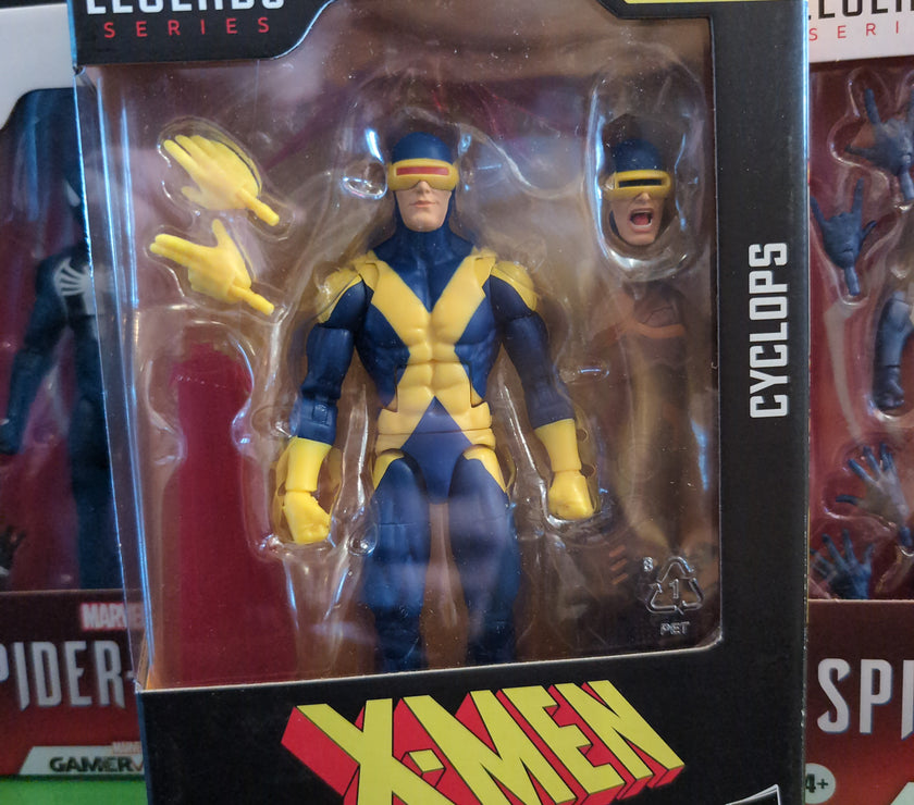 Hasbro Marvel Legends Cyclops X-Men action figure with interchangeable heads and hand accessories in collector packaging