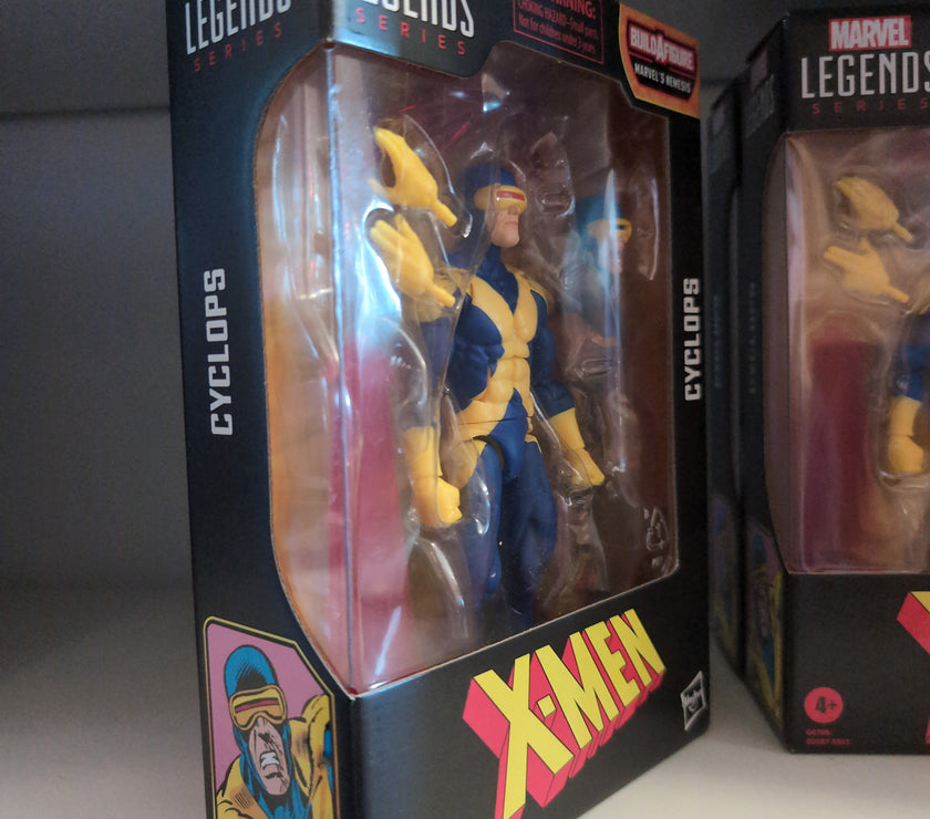 Hasbro Marvel Legends Cyclops 6-inch action figure from X-Men series in original packaging on display shelf