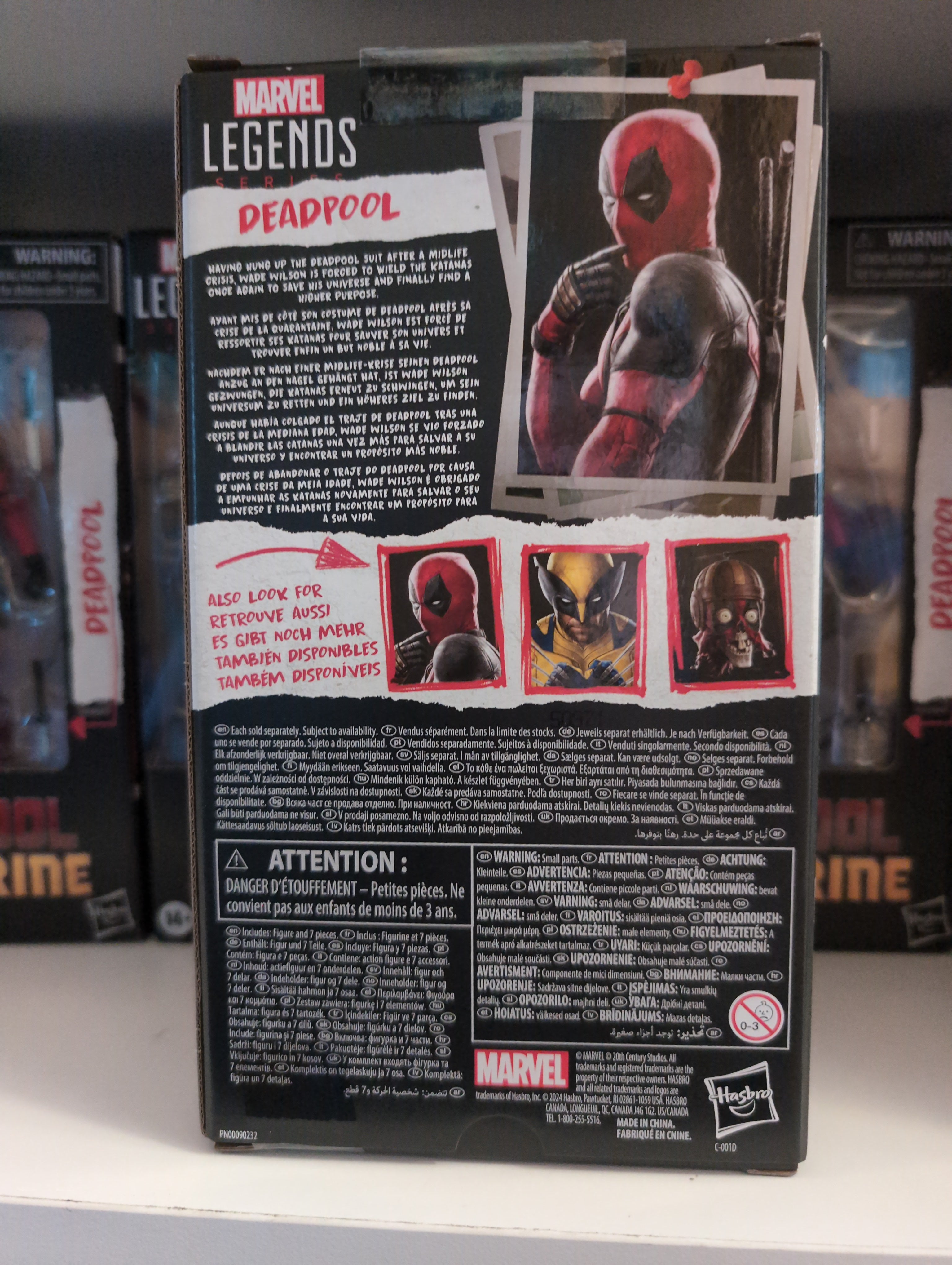 Hasbro Marvel Legends Deadpool action figure packaging showing character images and product information.