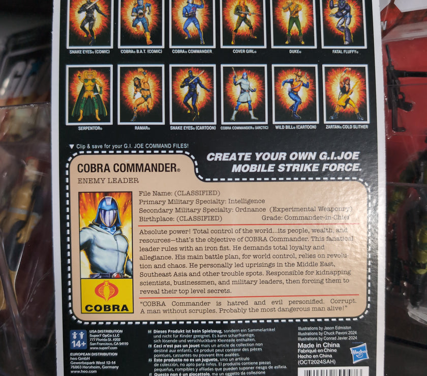 Hasbro Cobra Commander G.I. Joe action figure in blister card packaging with detailed character bio on back.