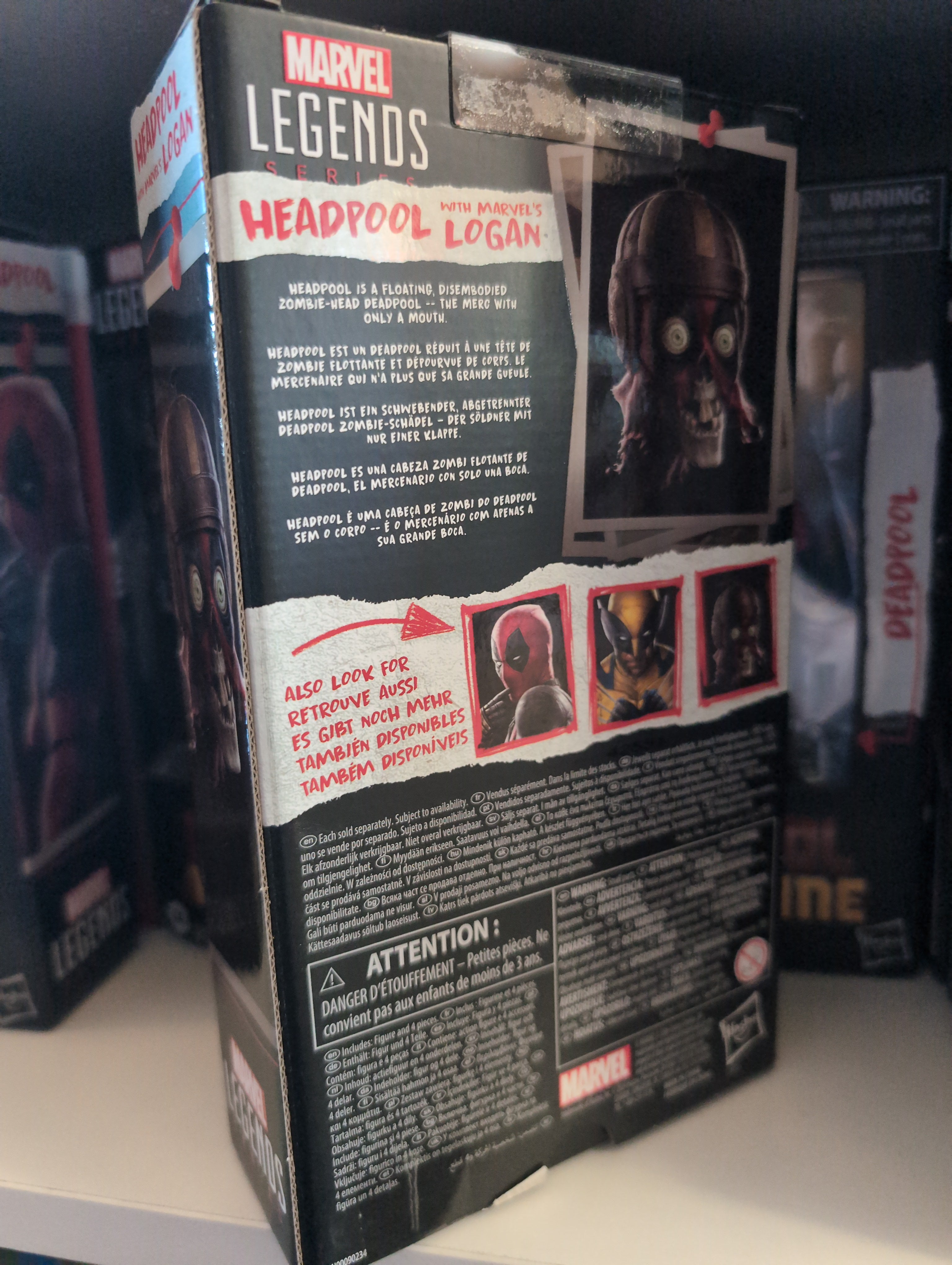 Hasbro Marvel Legends Headpool and Logan action figure box showing product details and character images.