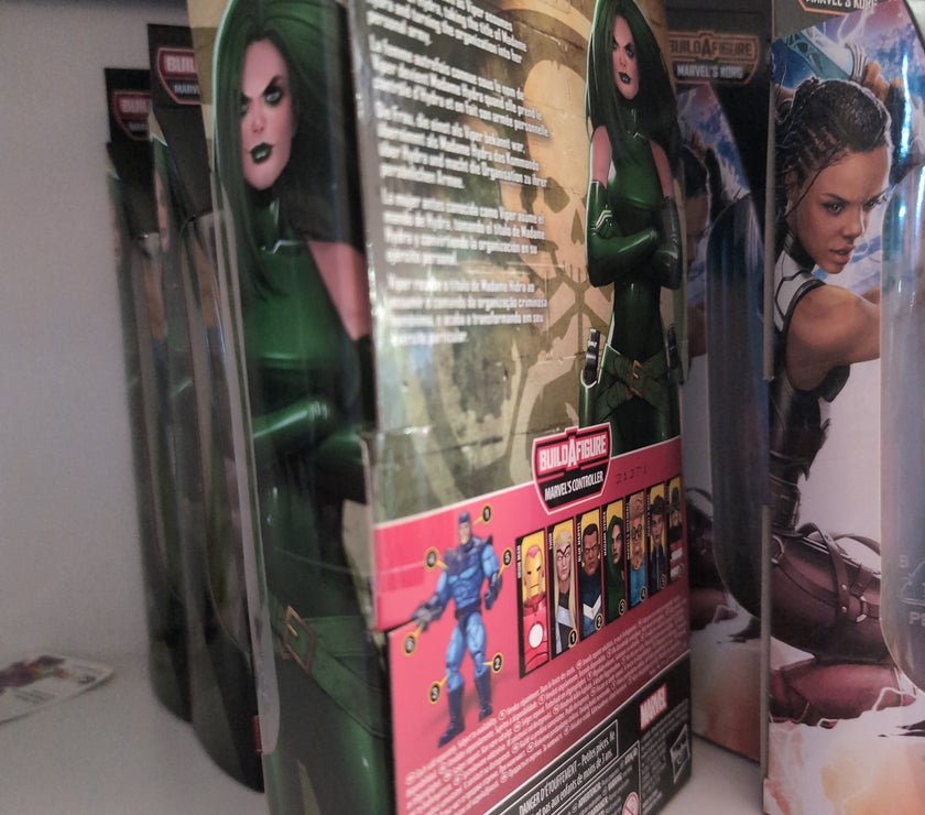 Hasbro Marvel Legends Madame Hydra action figure packaging showing character artwork and build-a-figure details.