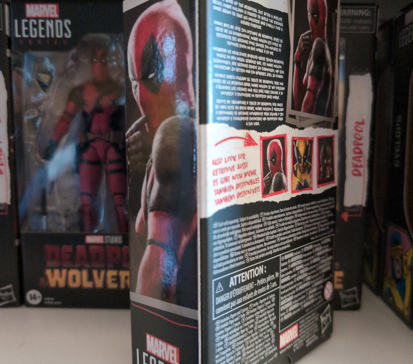 Hasbro Marvel Legends Deadpool action figure packaging with detailed character images on a store shelf