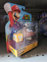 Super Mario Wave 49 - Goomba with ? Block 4" Action Figure Collectible by Jakks in packaging on shelf