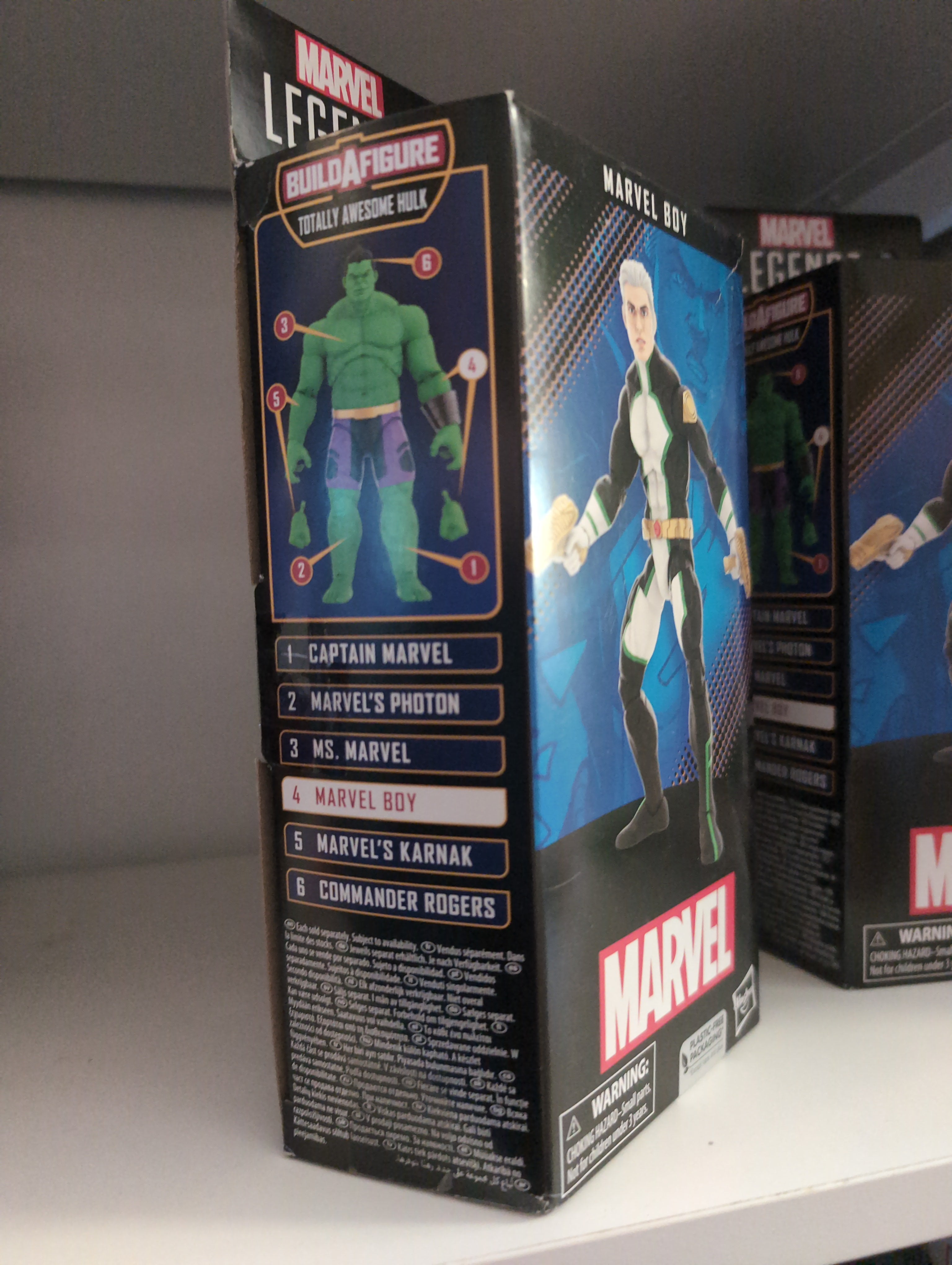 Hasbro Marvel Legends Marvel Boy action figure packaging showing Build-A-Figure Hulk and character details