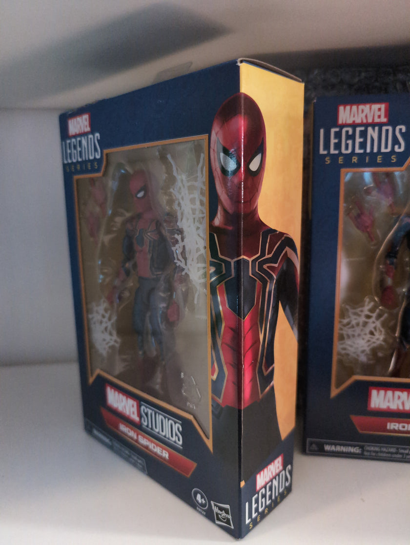 Hasbro Marvel Legends Iron Spider 6-inch action figure in packaging featuring red and gold suit design.