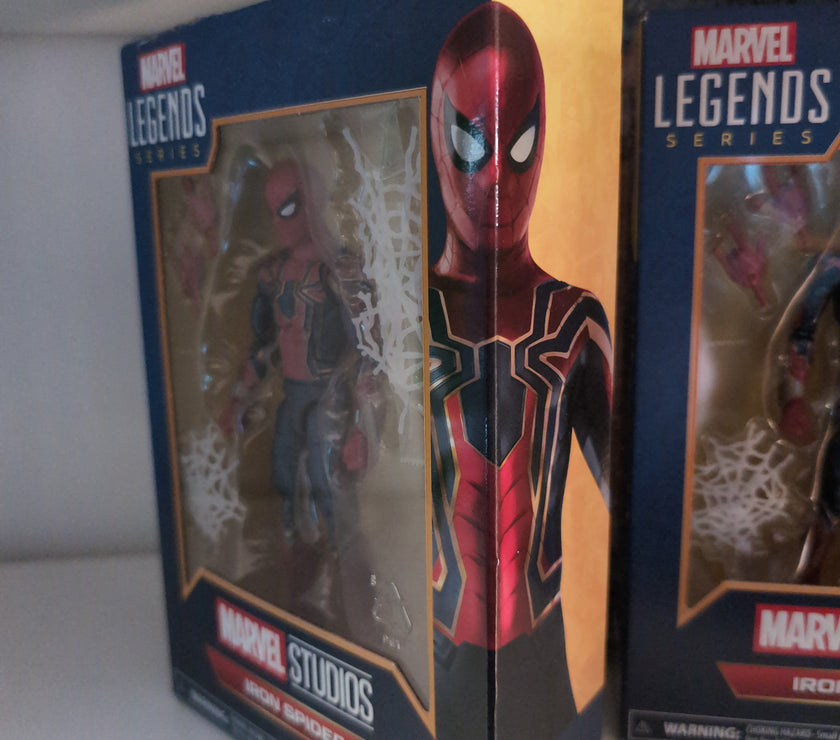 Hasbro Marvel Legends Iron Spider 6-inch action figure in packaging featuring red and gold suit design.