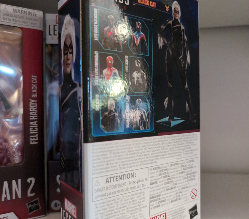 Hasbro Marvel Legends Black Cat action figure from Gamerverse Spider-Man 2 in detailed packaging on display shelf.