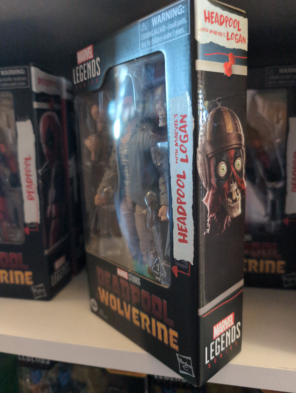 Hasbro Marvel Legends action figure pack featuring Deadpool Headpool and Logan Wolverine characters in display box