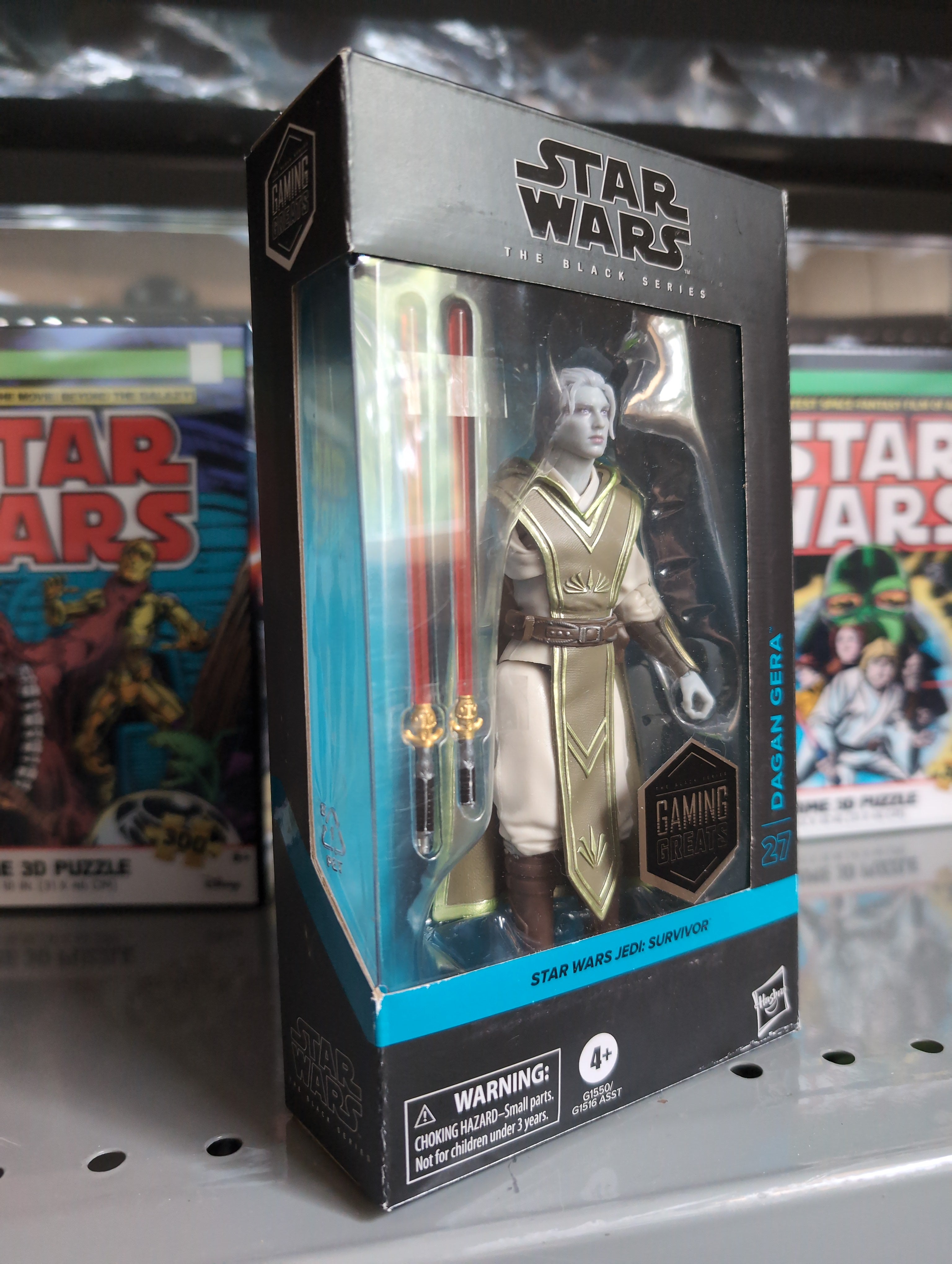 Hasbro Star Wars Black Series Dagan Gera Jedi Survivor action figure with dual red lightsabers in collectible window box packaging