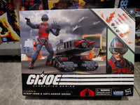 Hasbro GI Joe Classified Series 6-inch Scrap-Iron and Anti-Armor Drone action figure in box with accessories and combat background