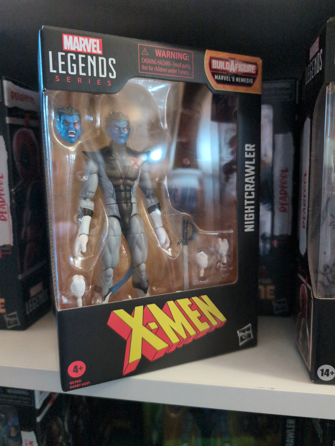 Hasbro Marvel Legends Nightcrawler action figure in packaging with X-Men and Build a Figure logo visible
