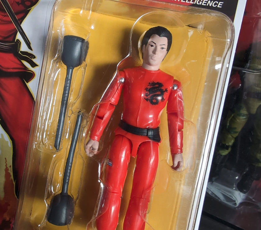 Hasbro GI Joe Jinx Ninja action figure in red outfit with sparring batons in blister packaging