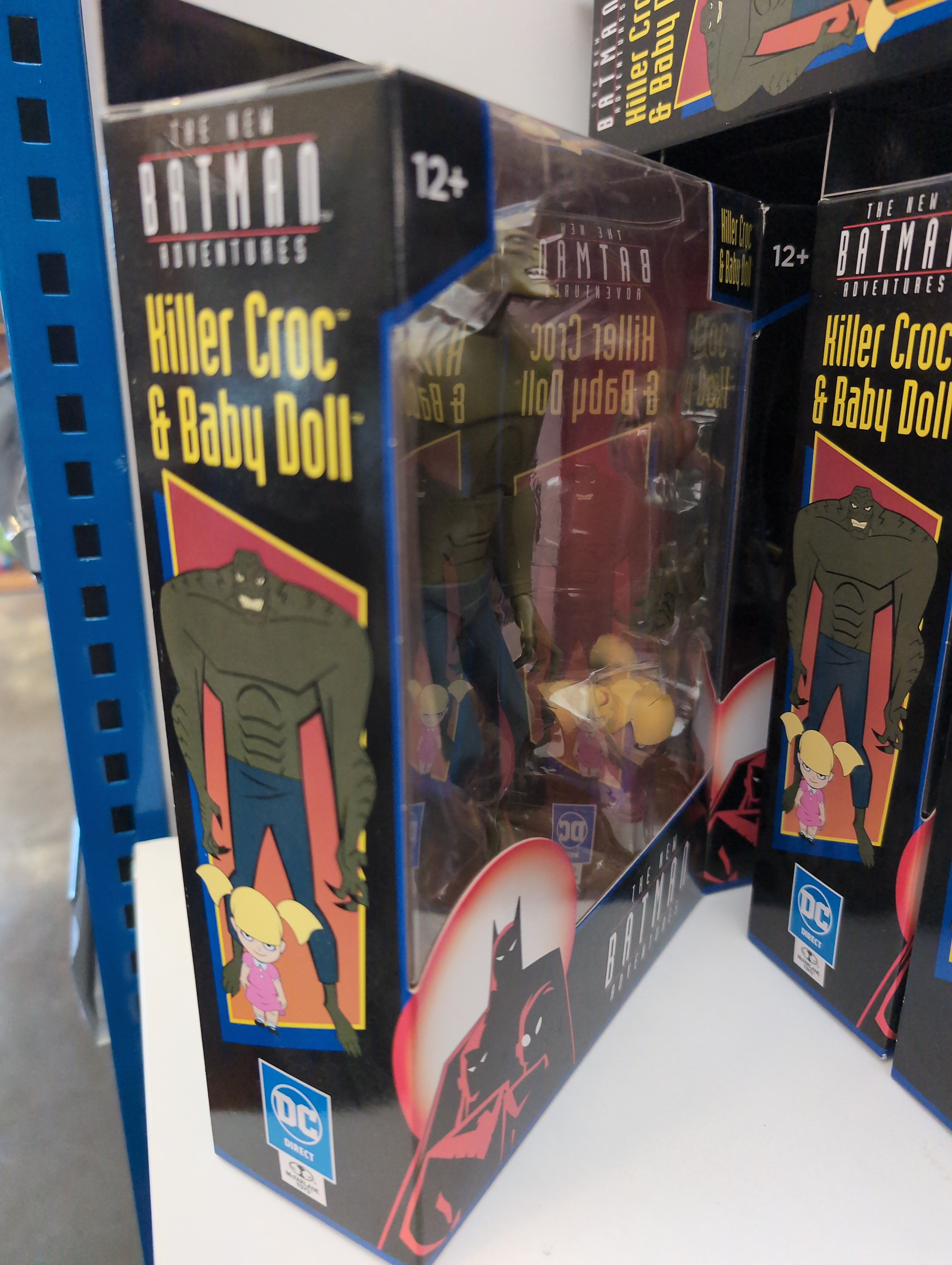 McFarlane Toys The New Batman Adventures Killer Croc and Baby Doll 6-inch action figure set in packaging.