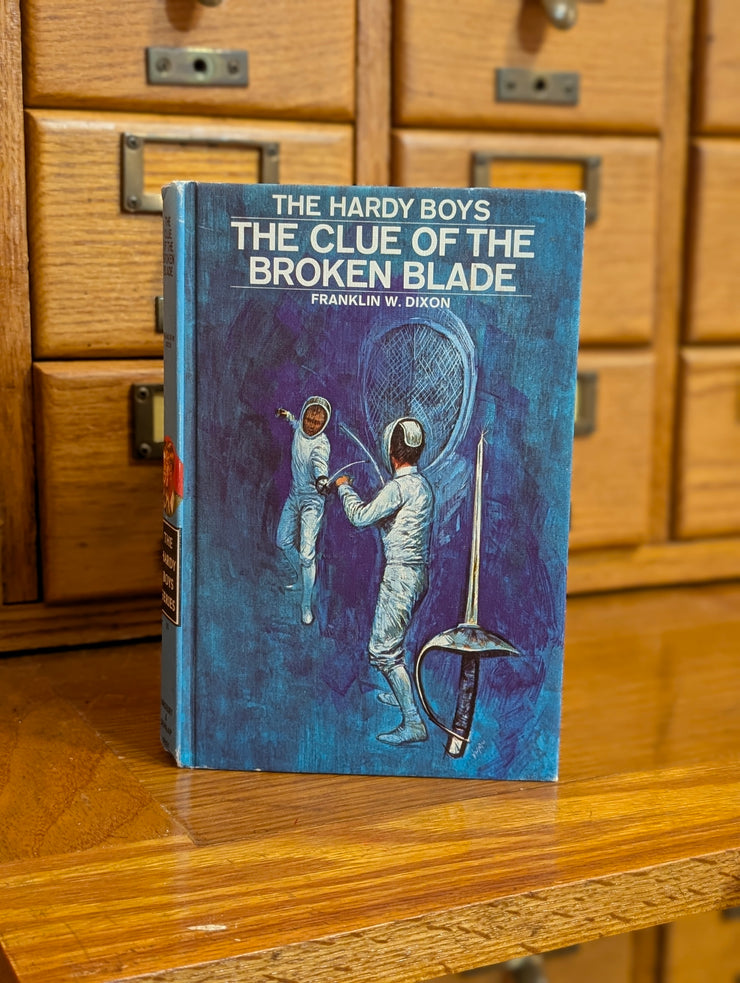 The Hardy Boys book The Clue of the Broken Blade by Grosset & Dunlap, Inc. with fencing-themed cover art