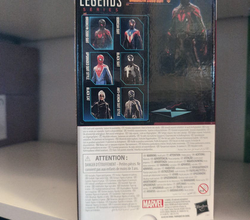 Hasbro Marvel Legends Series Miles Morales Brooklyn 2099 Suit action figure packaging showcasing multiple suit designs.