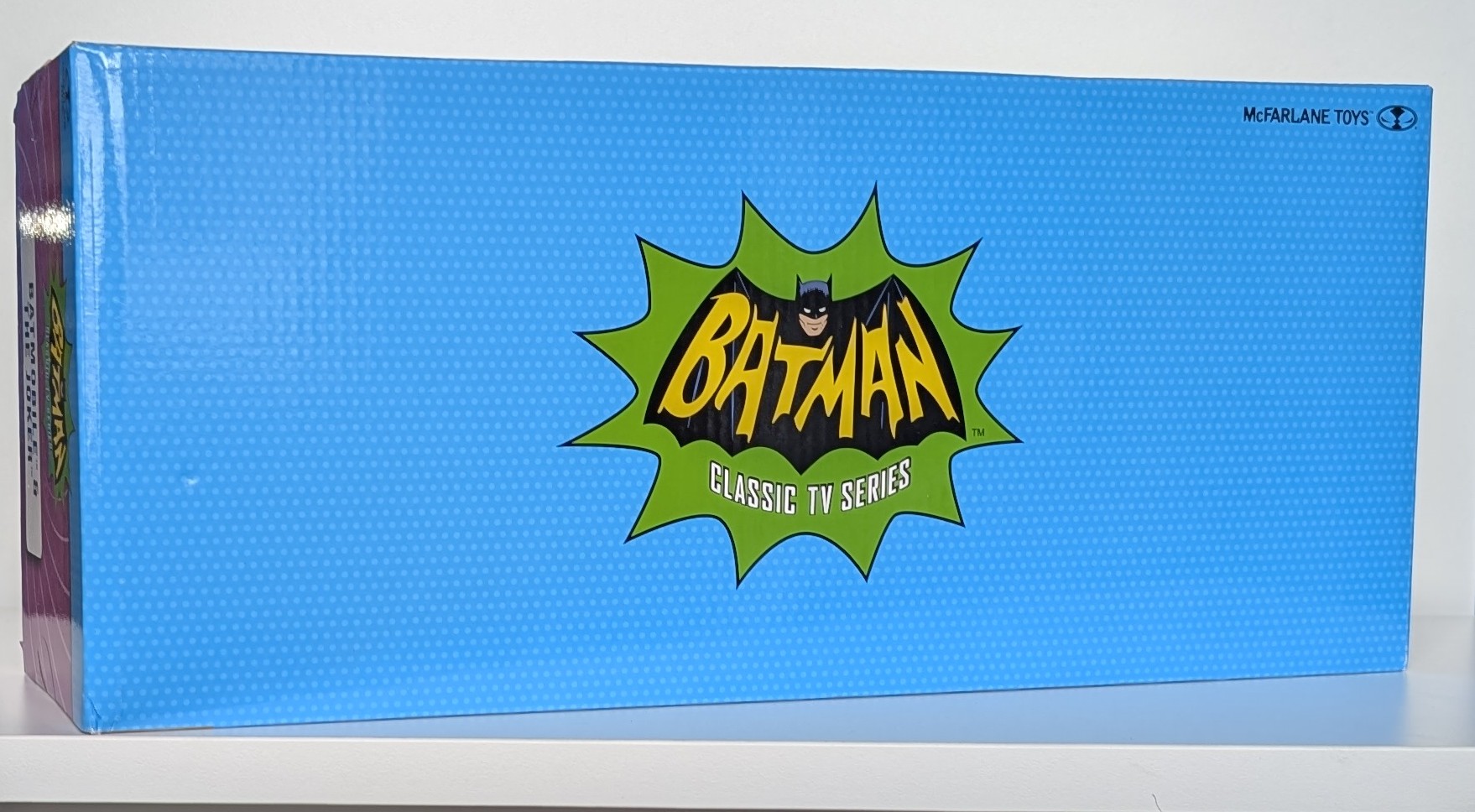 McFarlane Toys Batman '66 Batmobile and Joker Bat Mobile 1/12 scale collectible box side view with logo