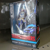 Wheeljack Transformers:Dark of the Moon Studio Series Action Figure by Hasbro in collectible packaging on display shelf