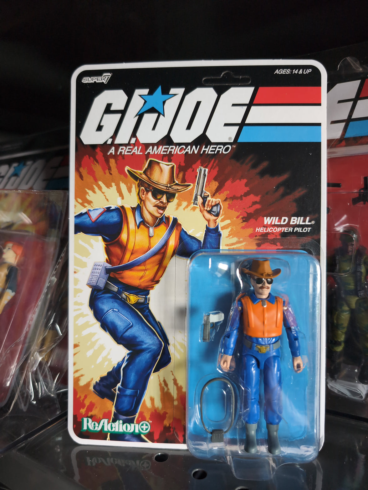 Hasbro G.I. Joe Wild Bill Helicopter Pilot action figure in classic packaging with cowboy hat and accessories
