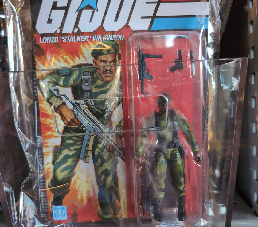 GI Joe Lonzo Stalker Wilkinson action figure in original Hasbro packaging with accessories and retro artwork.