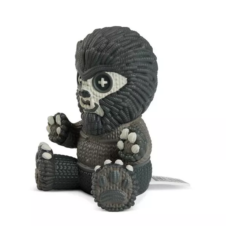 Handmade by Robots Wolf Man Glow in the Dark Vinyl Figure #248 sitting with detailed textured fur and button eyes