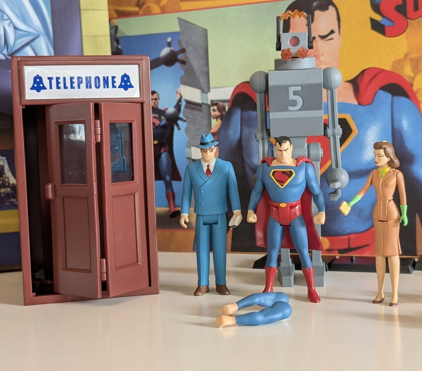Superman The Mechanical Monsters 1941 collectible action figure set featuring Superman, robot, and characters with telephone booth