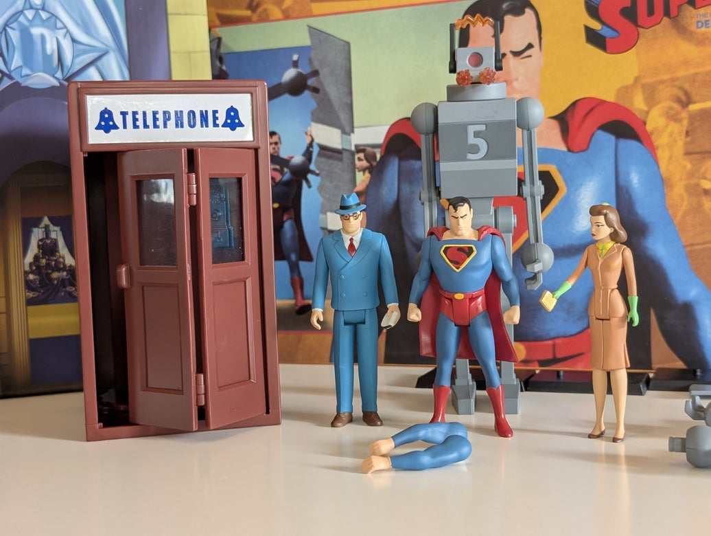 Superman The Mechanical Monsters 1941 collectible action figure set featuring Superman, robot, and characters with telephone booth