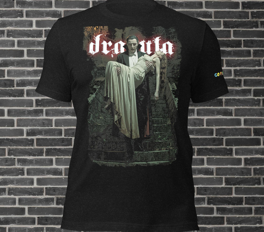 Dracula Classic Horror Unisex t-shirt featuring Dracula holding a woman on a dark stairway design